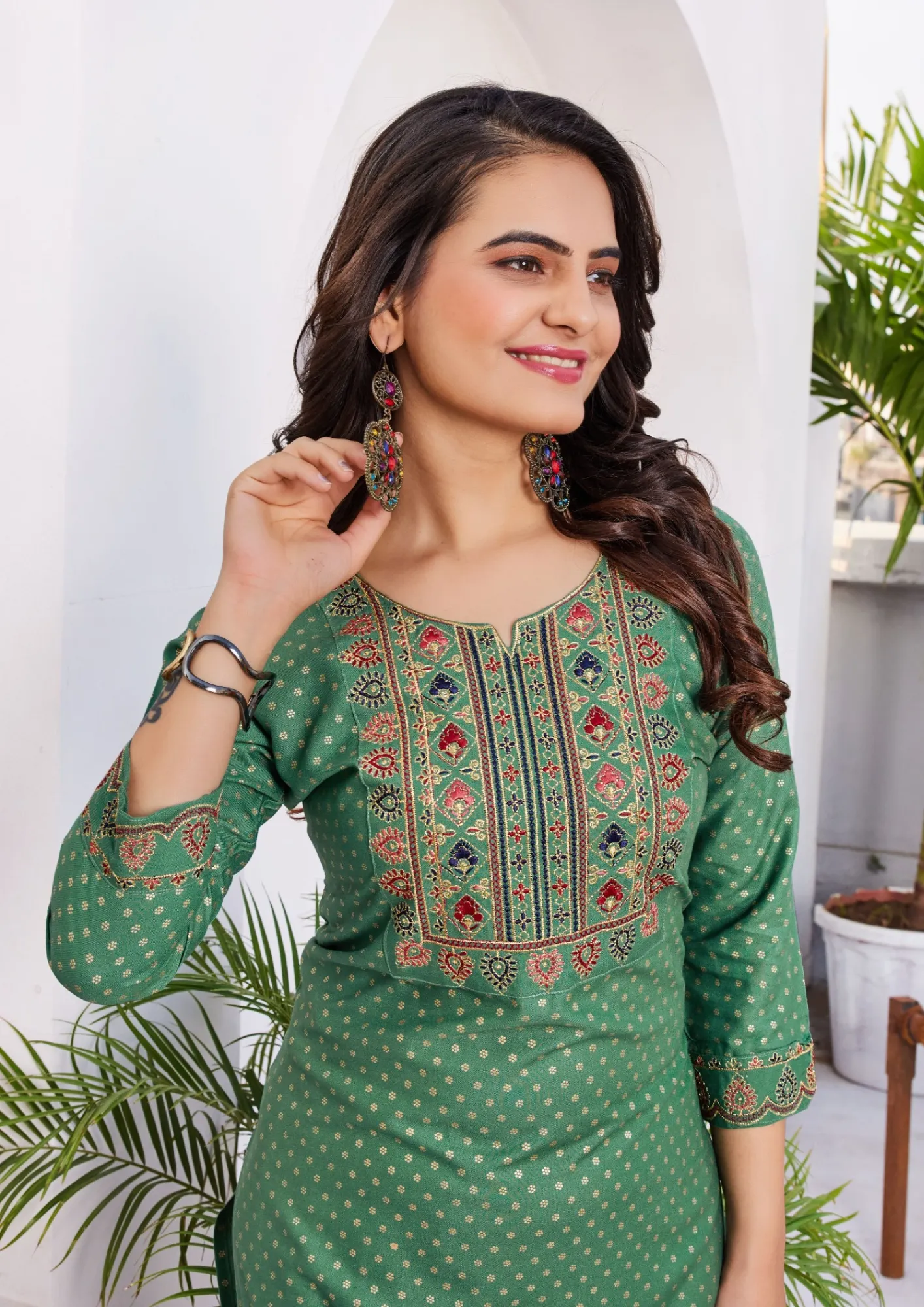 Attractive Green Colored Dot Design Rayon Kurti With Thread Embroidery Work