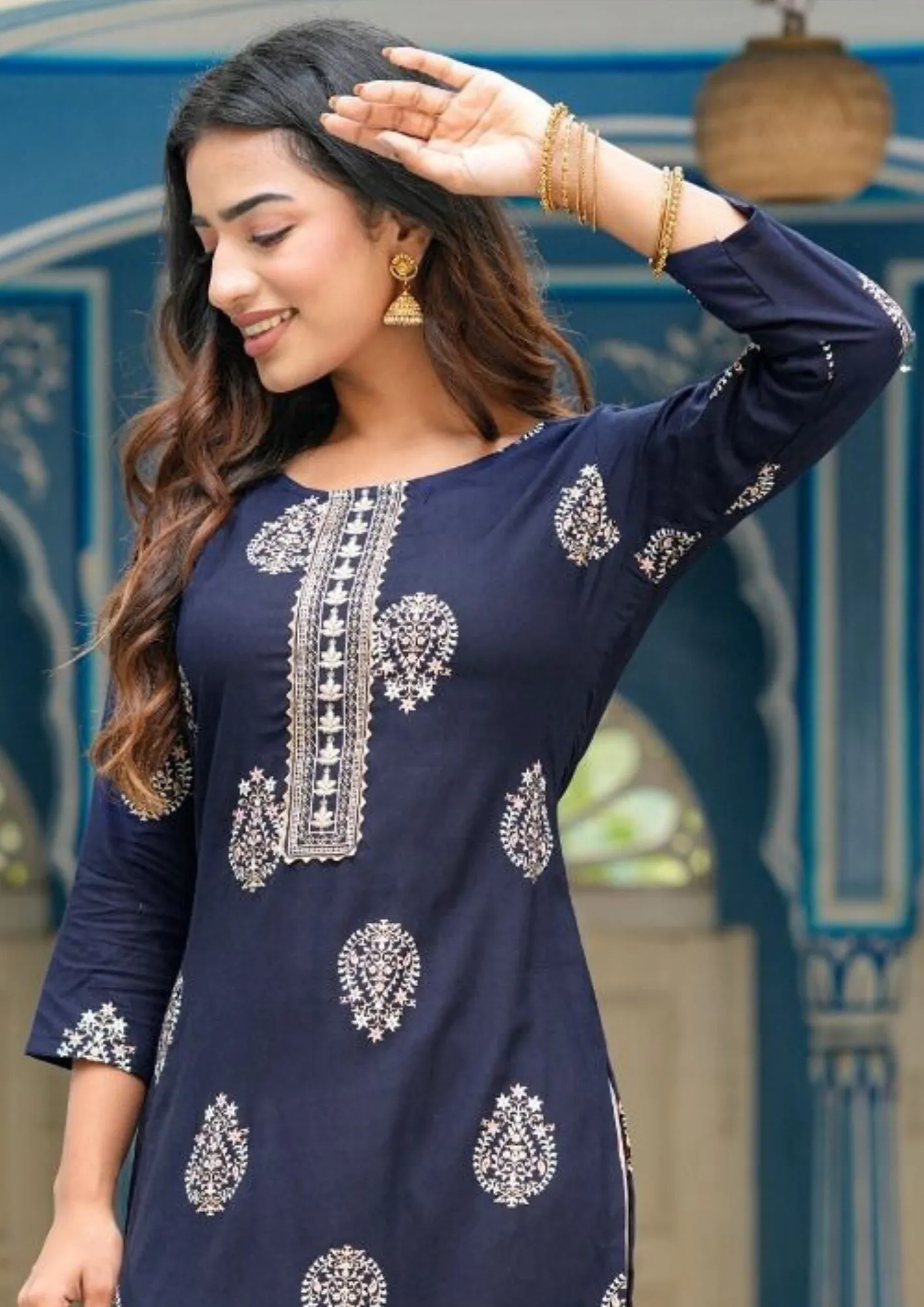 Charming Dark Blue Colored Rayon Gold print Kurti With Fancy Embroidery Work